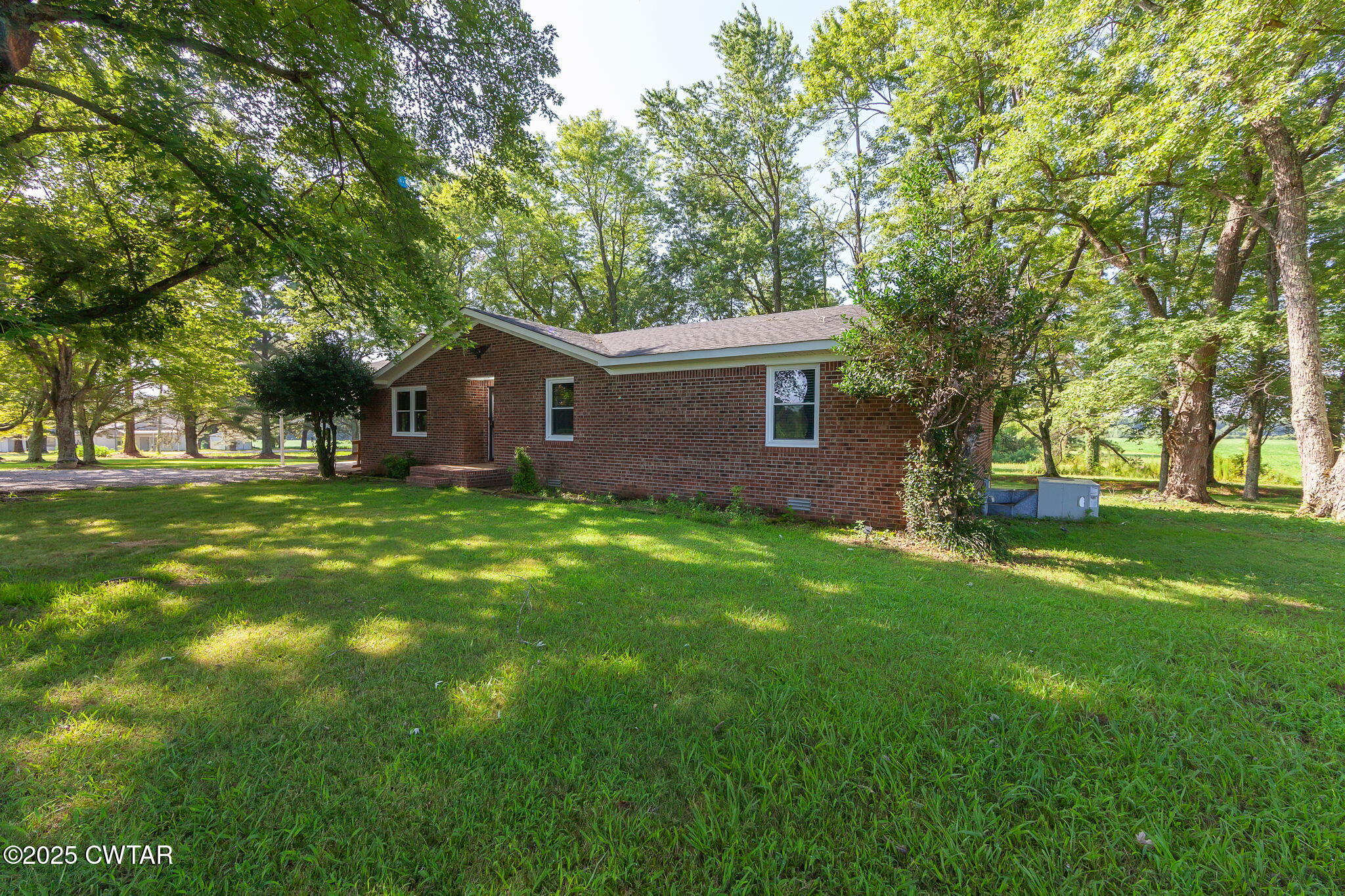 1140 Plainview Road Henderson, TN 38340 - Photo 2 of 29 a view of house with a big yard
