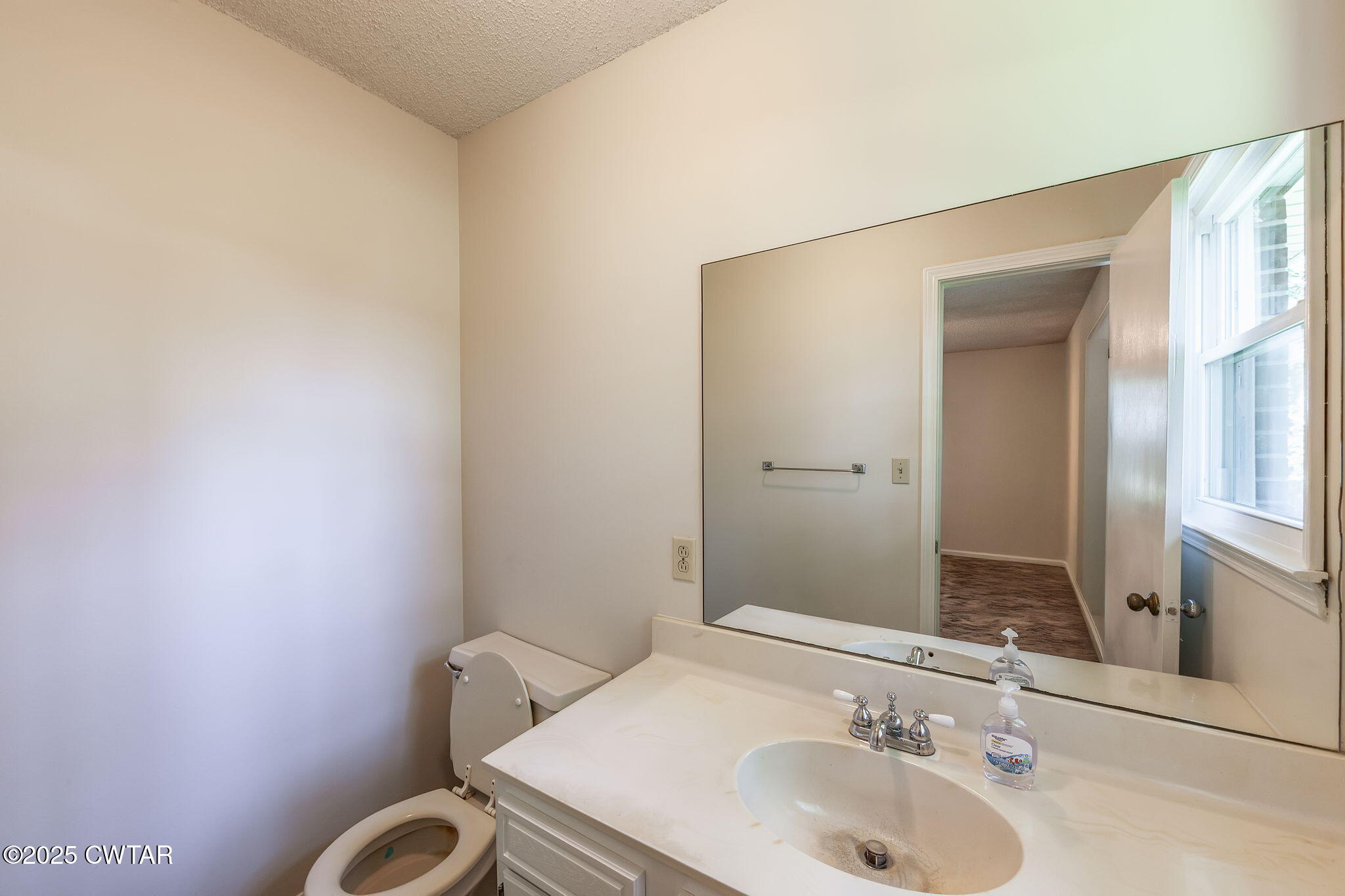 1140 Plainview Road Henderson, TN 38340 - Photo 23 of 29 a bathroom with a sink and a mirror