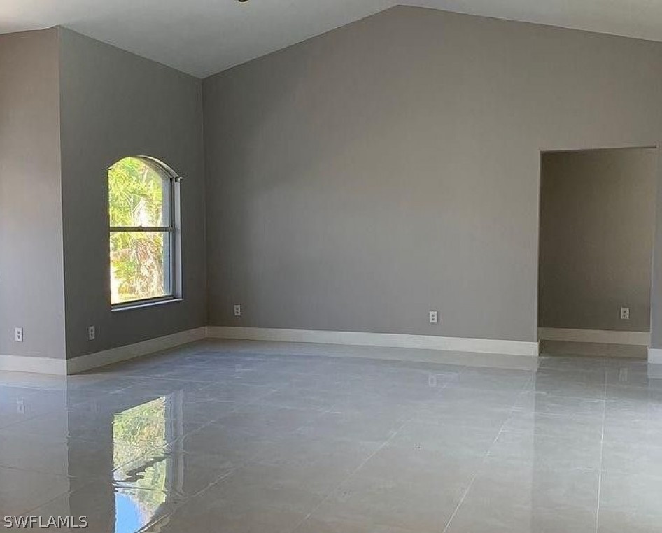 3353 Captains Cove Naples, FL 34112 - Photo 13 of 13 an empty room with a window