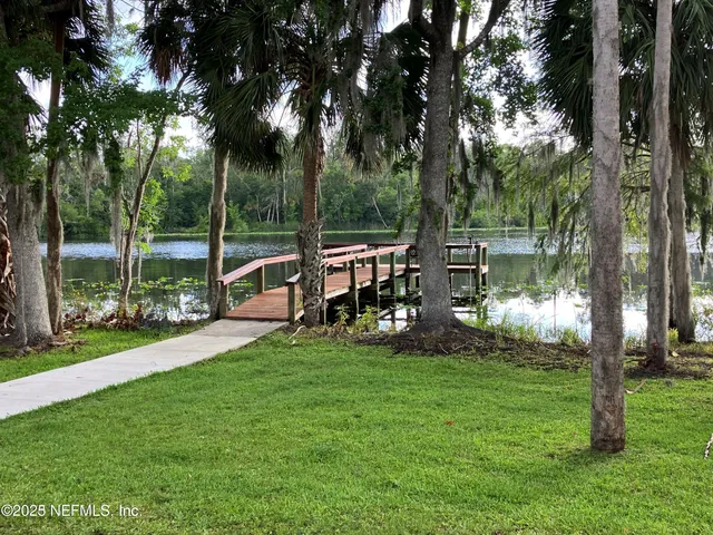 a view of a park with swings and slides