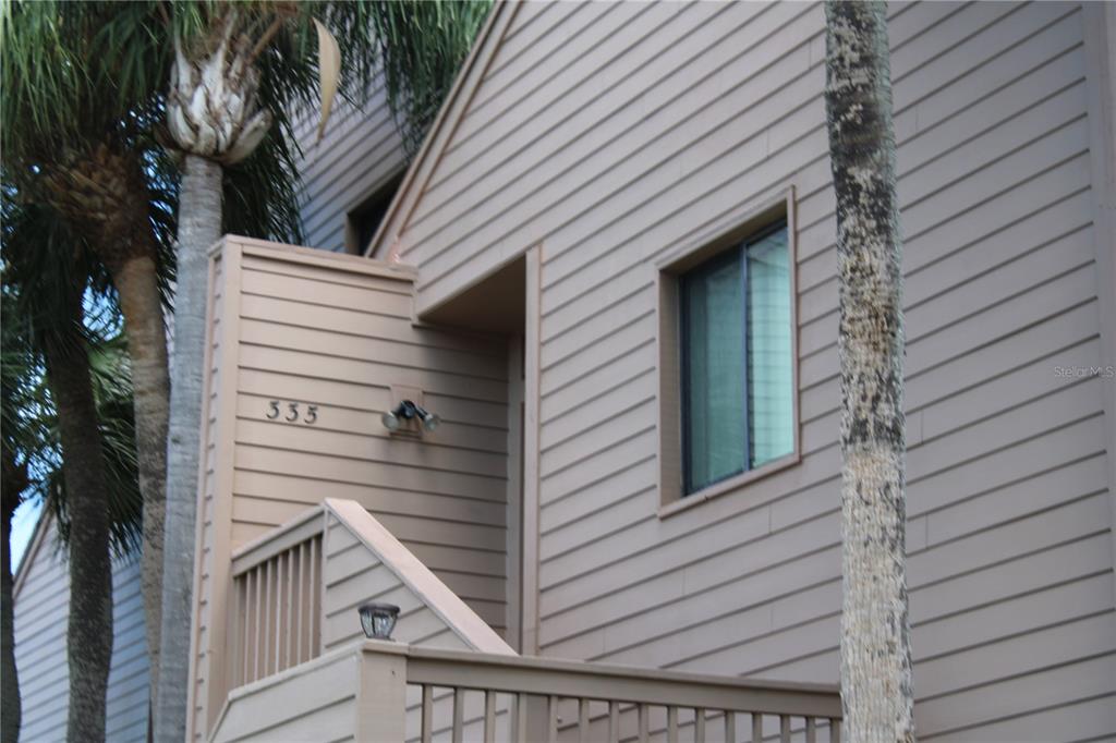 335 Windrush Loop, Unit 335 Tarpon Springs, FL 34689 - Photo 1 of 18 a view of outdoor space and deck
