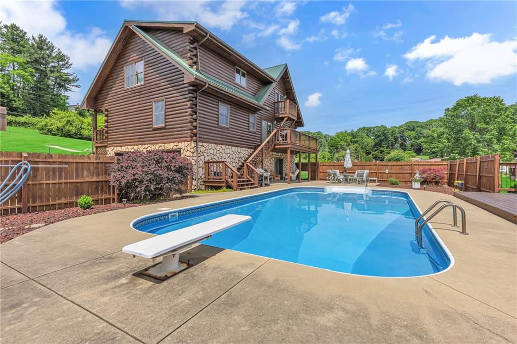 303 Sharon Grange Road Aliquippa, PA 15001 - Photo 37 of 50 Great photo of the pool area and the rear of the home. Everything about this home is perfect.