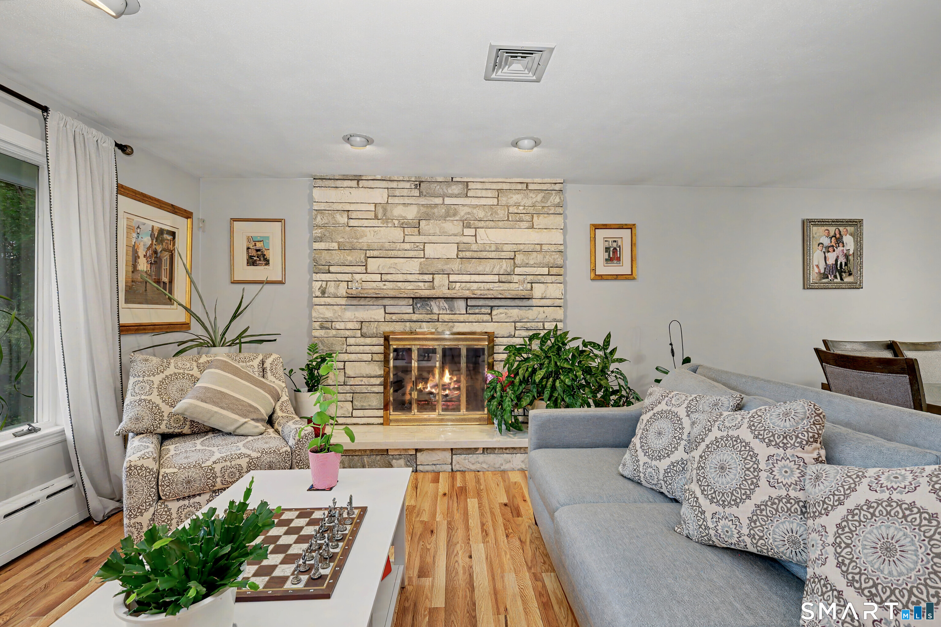 44 Haverhill Road Trumbull, CT 06611 - Photo 7 of 32 a living room with furniture and a large window