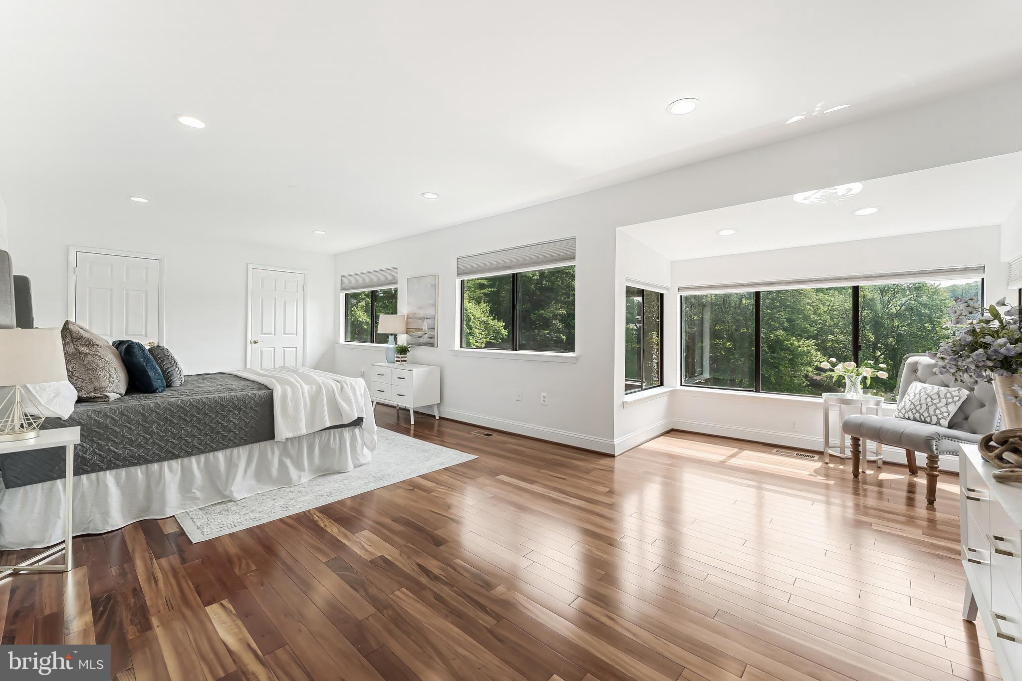 2127 Cabots Point Lane Reston, VA 20191 - Photo 34 of 66 a living room with furniture and a large window