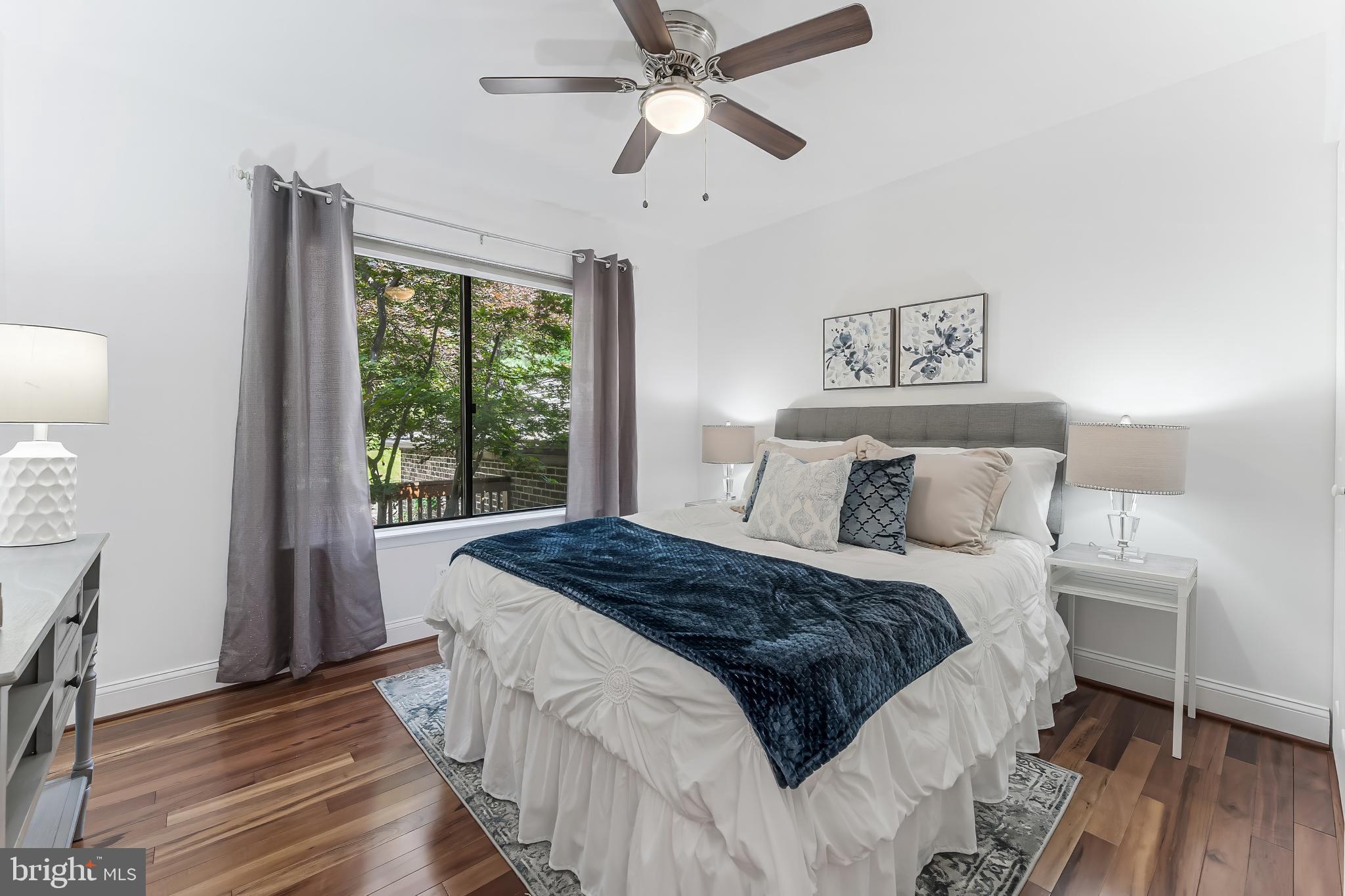 2127 Cabots Point Lane Reston, VA 20191 - Photo 46 of 66 a bedroom with a bed and a window