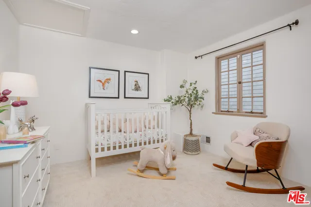 a view of room with furniture and windows