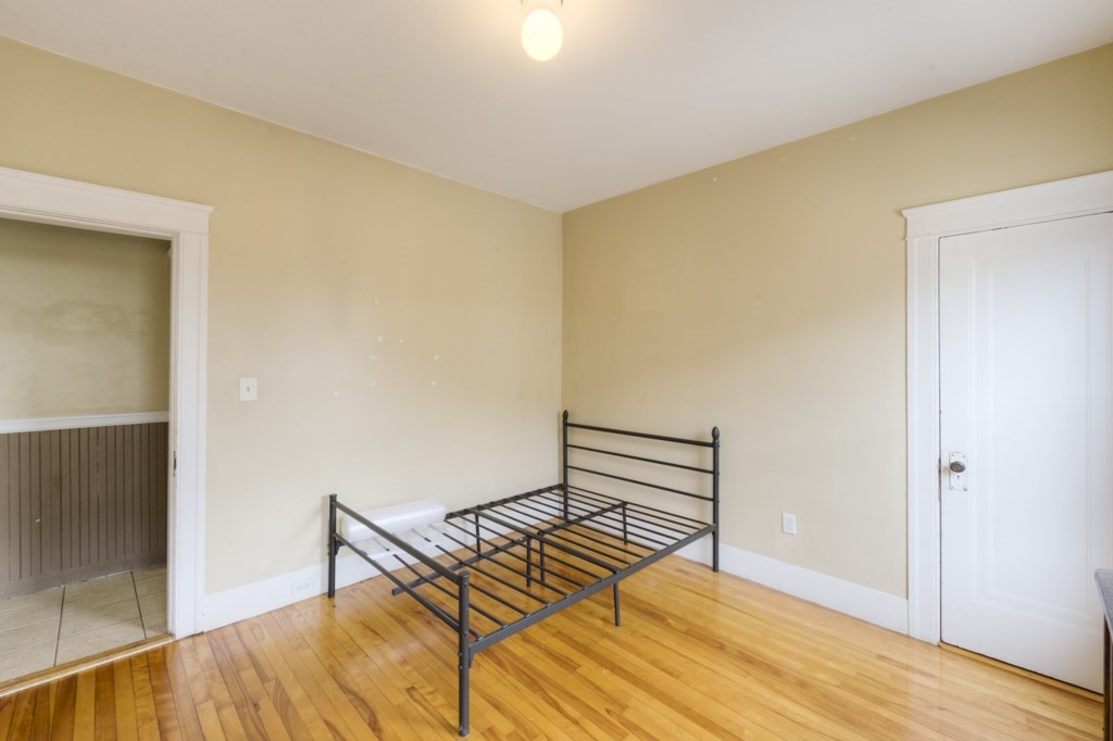 39 Woodford Street, Unit 3 Worcester, MA 01604 - Photo 33 of 37 a view of a room with wooden floor