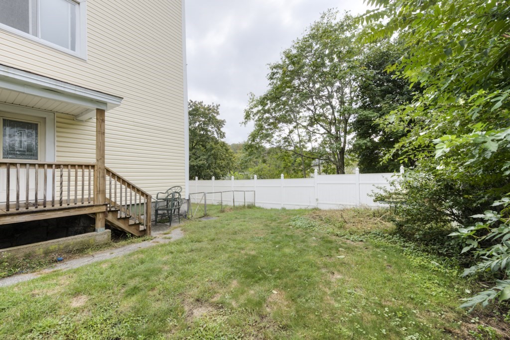 39 Woodford Street, Unit 3 Worcester, MA 01604 - Photo 36 of 37 a view of backyard with deck and deck