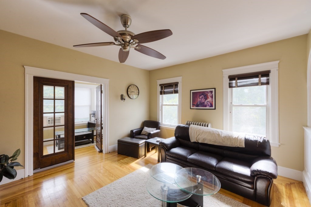 39 Woodford Street, Unit 3 Worcester, MA 01604 - Photo 6 of 37 a bedroom with furniture and a window