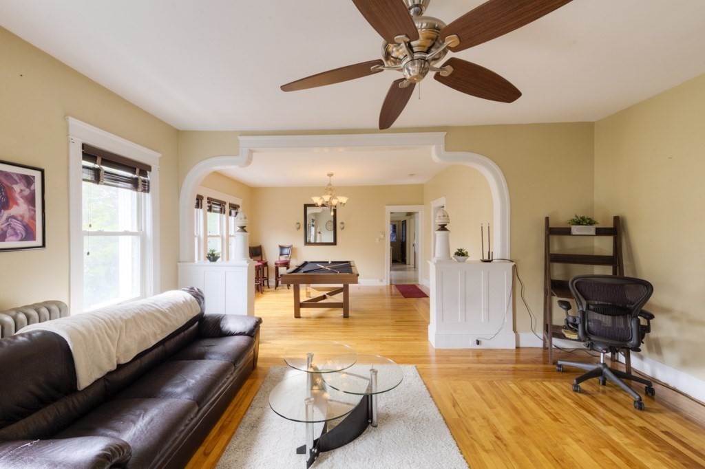 39 Woodford Street, Unit 3 Worcester, MA 01604 - Photo 7 of 37 a living room with furniture and a rug