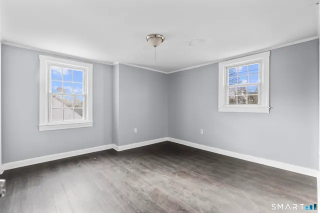 a view of a hallway with staircase