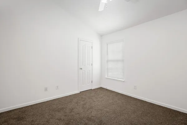 an empty room with an entryway