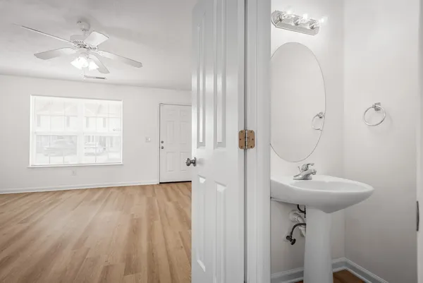 a kitchen with stainless steel appliances a stove a refrigerator and a microwave