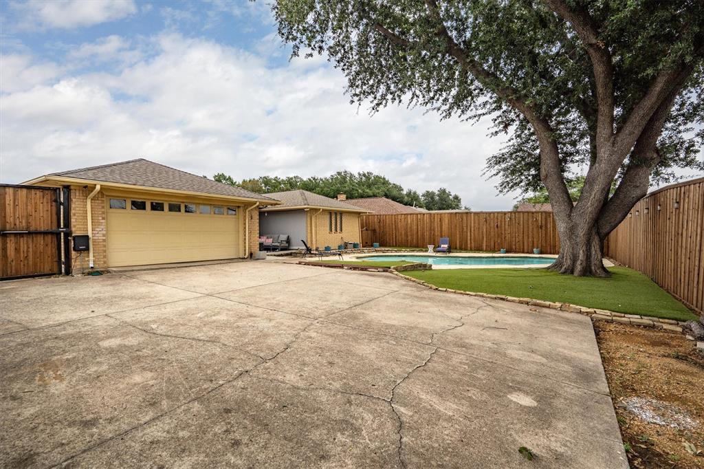 2214 Valley Mill Carrollton, TX 75006 - Photo 35 of 36 a view of a house with a yard
