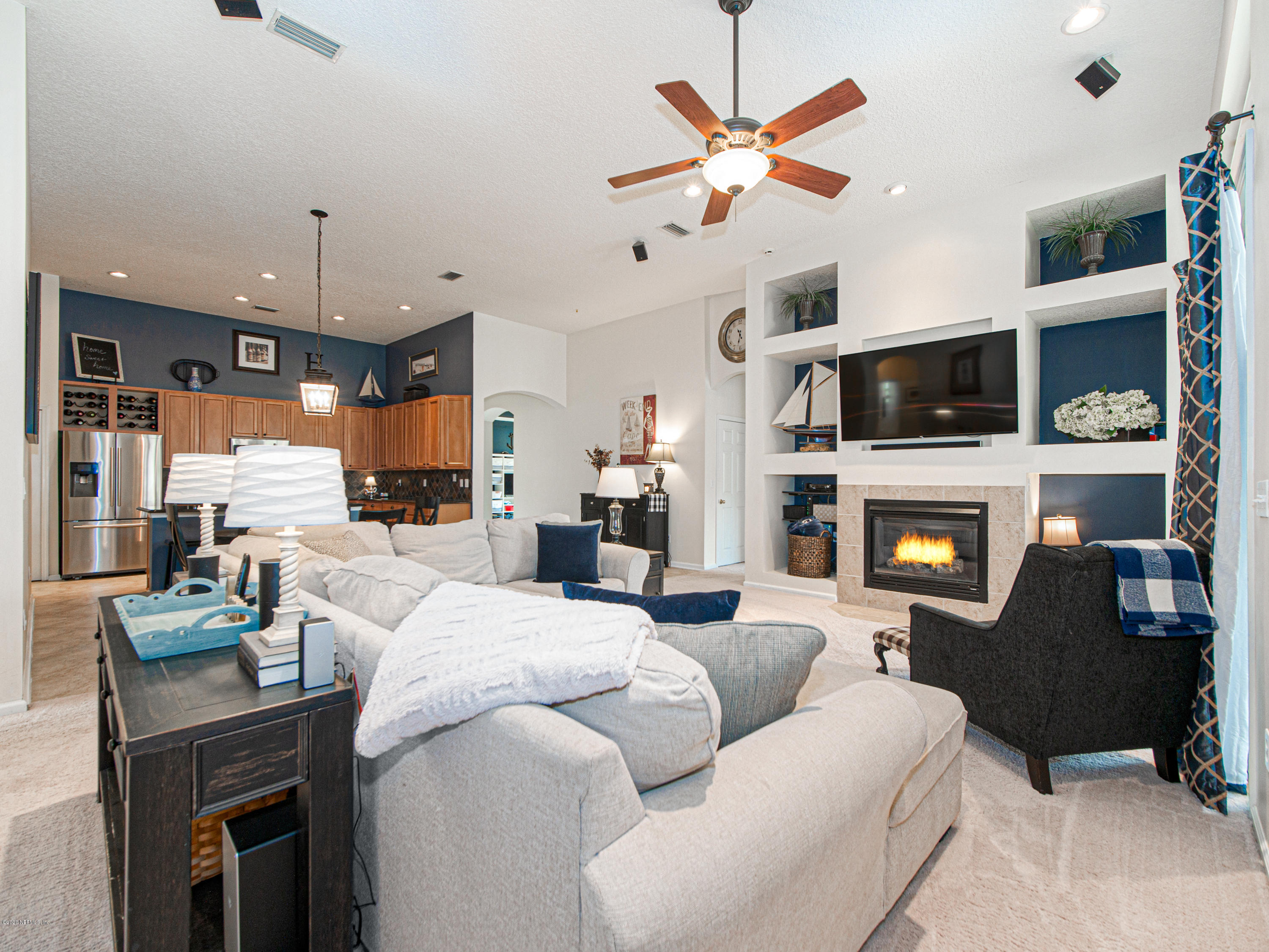 6489 Ginnie Springs Road Jacksonville, FL 32258 - Photo 2 of 38 GAS Fireplace & Built In Shelving