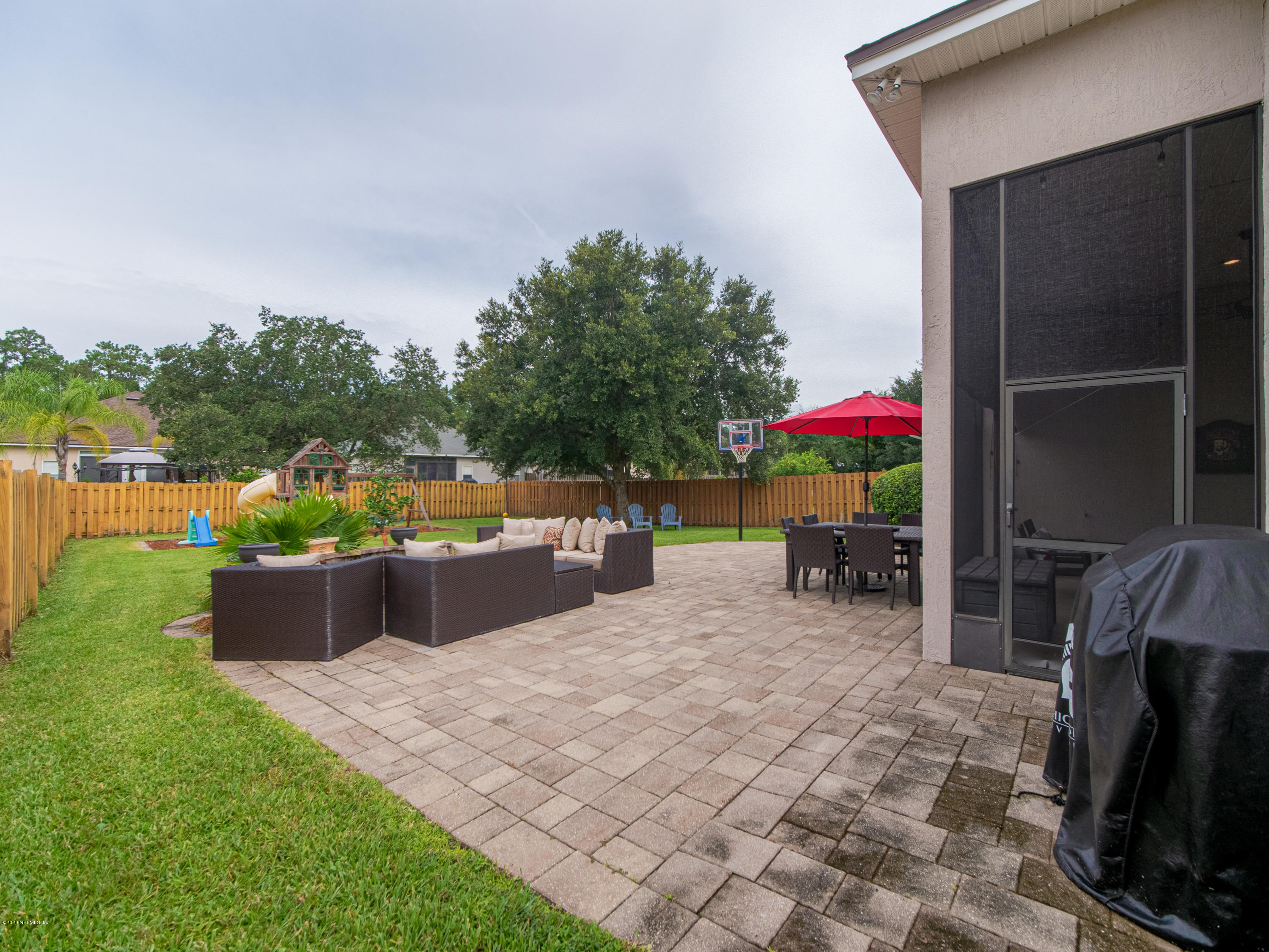 6489 Ginnie Springs Road Jacksonville, FL 32258 - Photo 22 of 38 Extended Paver Patio!