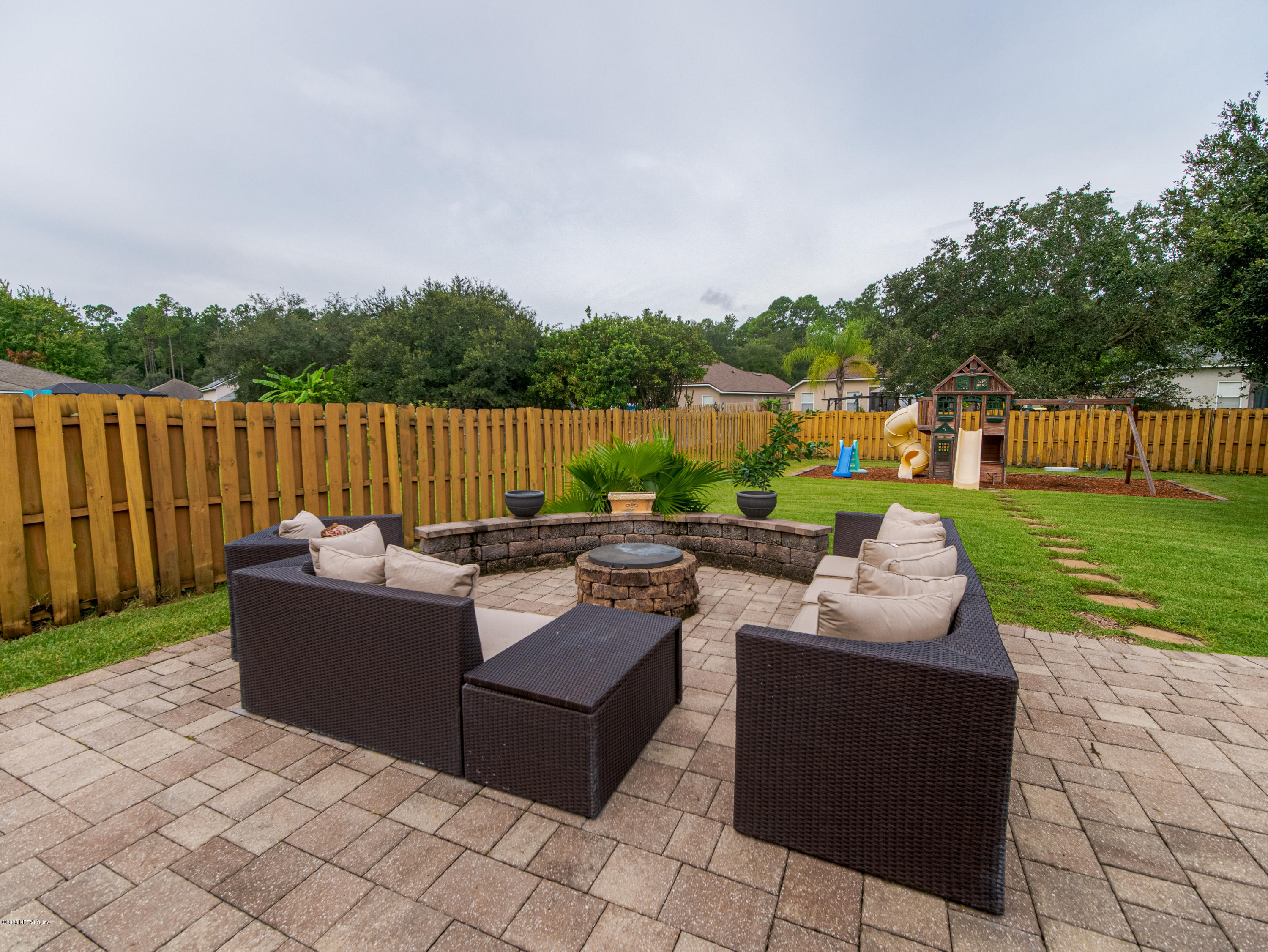 6489 Ginnie Springs Road Jacksonville, FL 32258 - Photo 5 of 38 Firepit Seating Area!