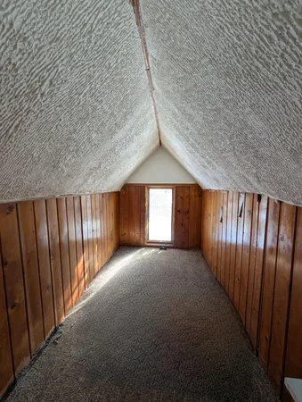 a view of hallway with stairs