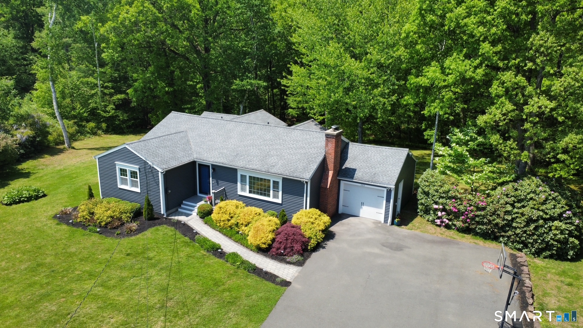 1013 Ratley Road Suffield, CT 06093 - Photo 37 of 39 front view of a house with a yard