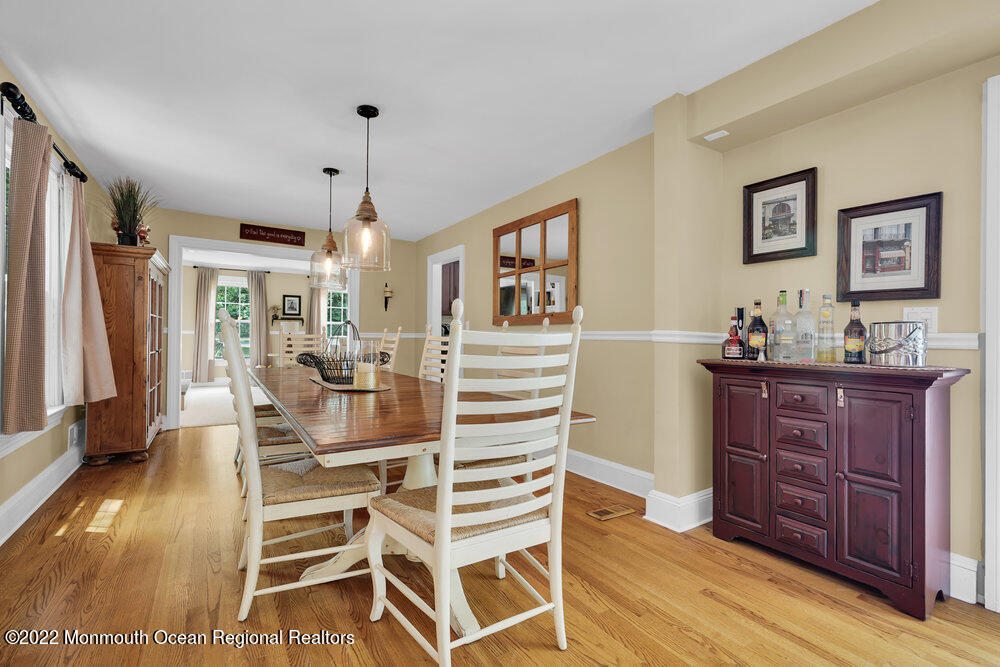 1722 Burrsville Road Brick, NJ 08724 - Photo 21 of 71 a view of a dining room with furniture window and wooden floor