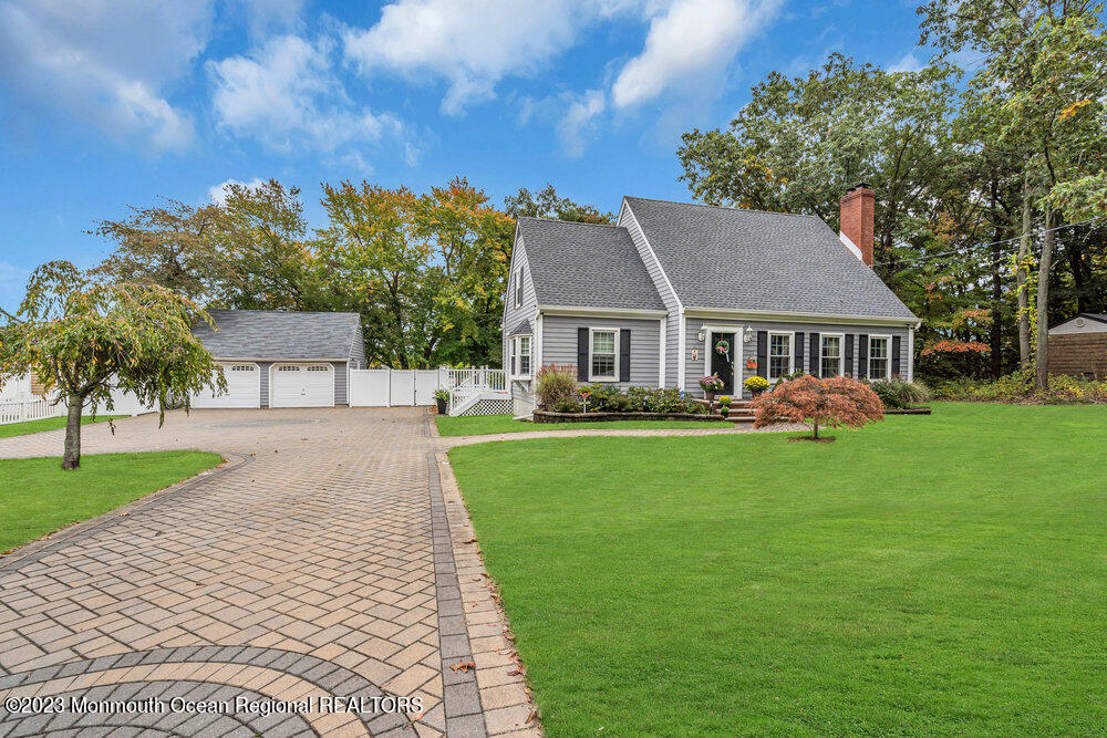 1722 Burrsville Road Brick, NJ 08724 - Photo 3 of 71 a front view of a house with a yard