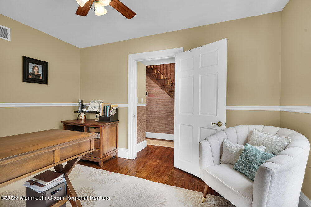 1722 Burrsville Road Brick, NJ 08724 - Photo 37 of 71 a living room with furniture and wooden floor