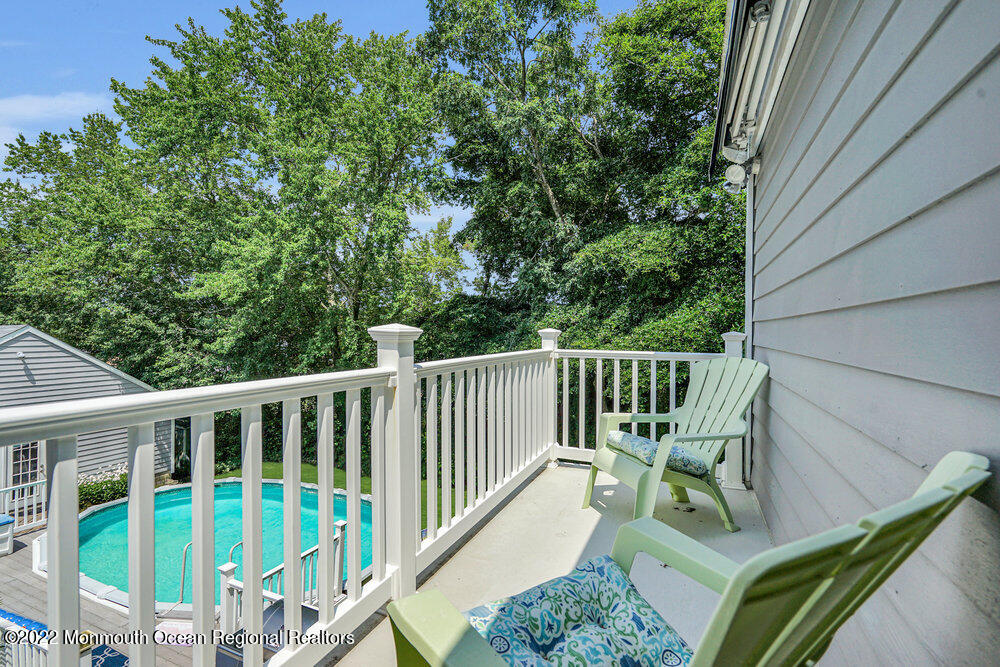 1722 Burrsville Road Brick, NJ 08724 - Photo 58 of 71 a view of a chair and tables in the balcony