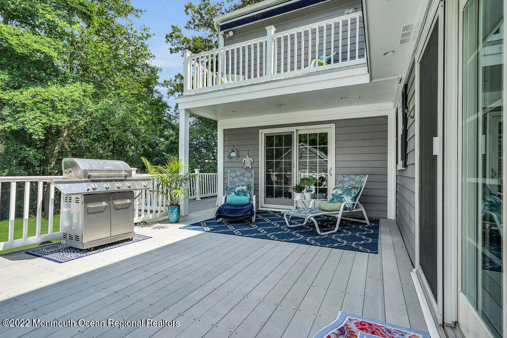 1722 Burrsville Road Brick, NJ 08724 - Photo 69 of 71 a balcony with furniture and wooden floor