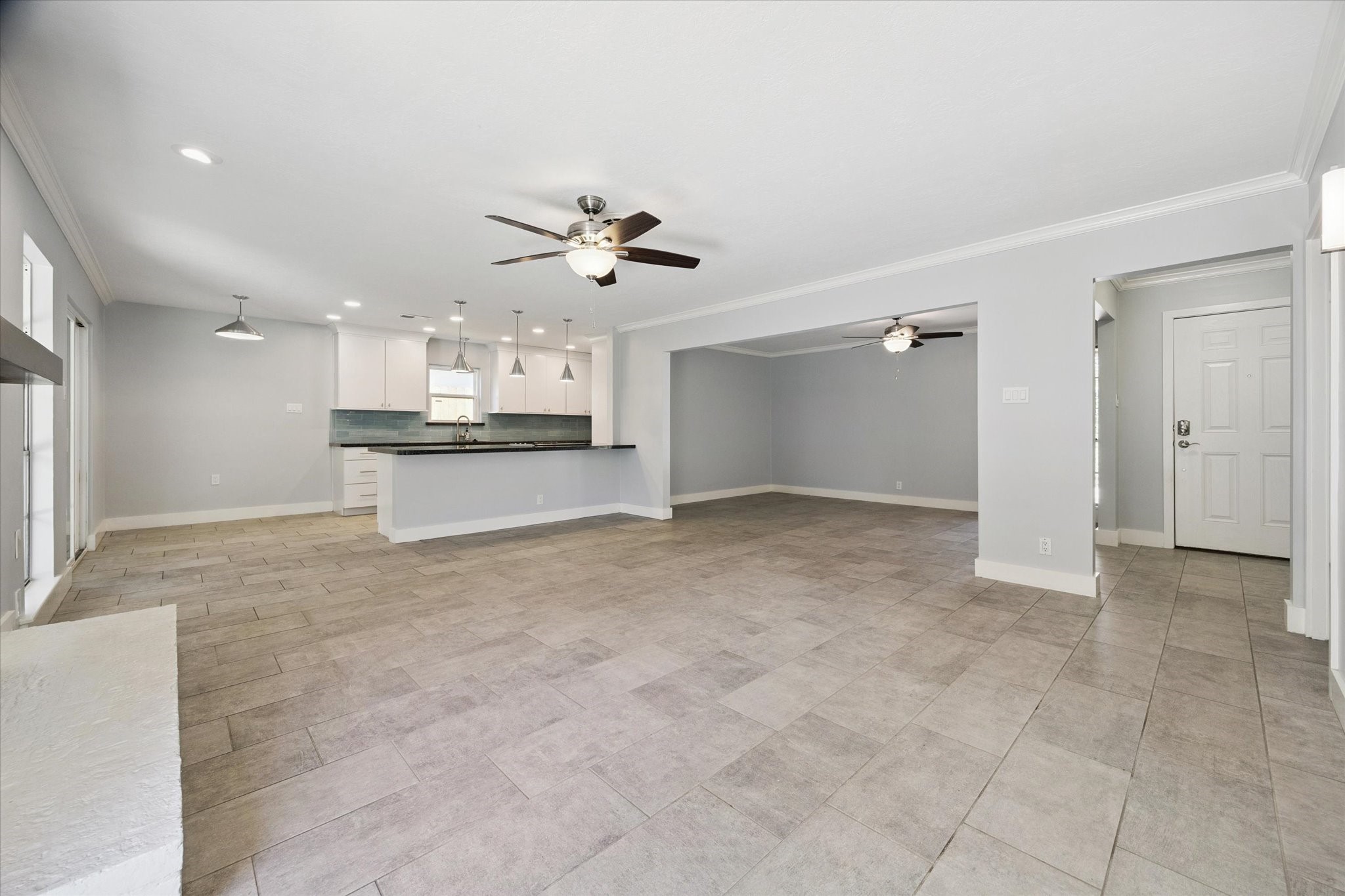 9407 Meadowbriar Lane Houston, TX 77063 - Photo 13 of 31 a view of a kitchen with a sink and a window