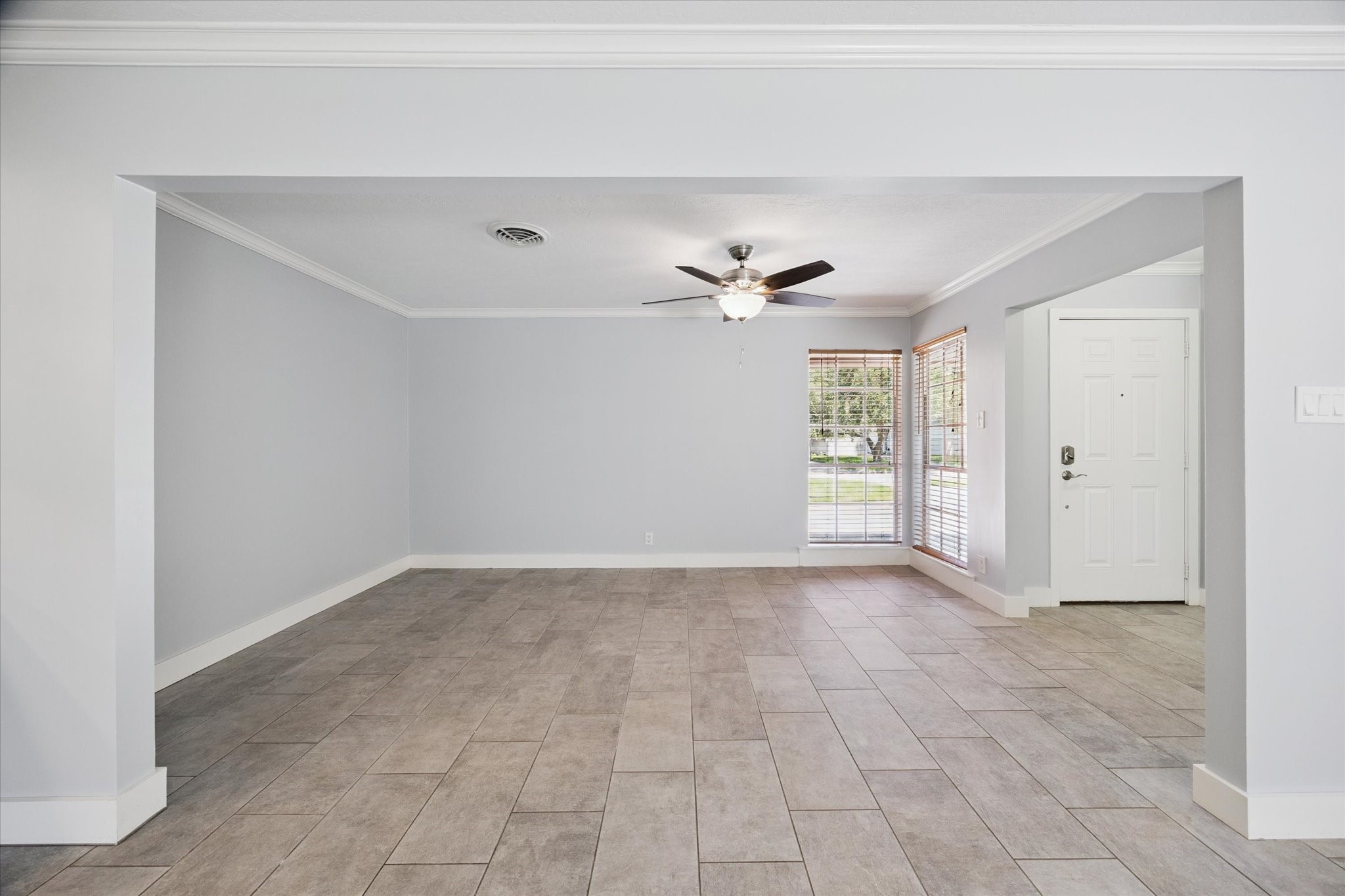 9407 Meadowbriar Lane Houston, TX 77063 - Photo 20 of 31 a view of an empty room with a window