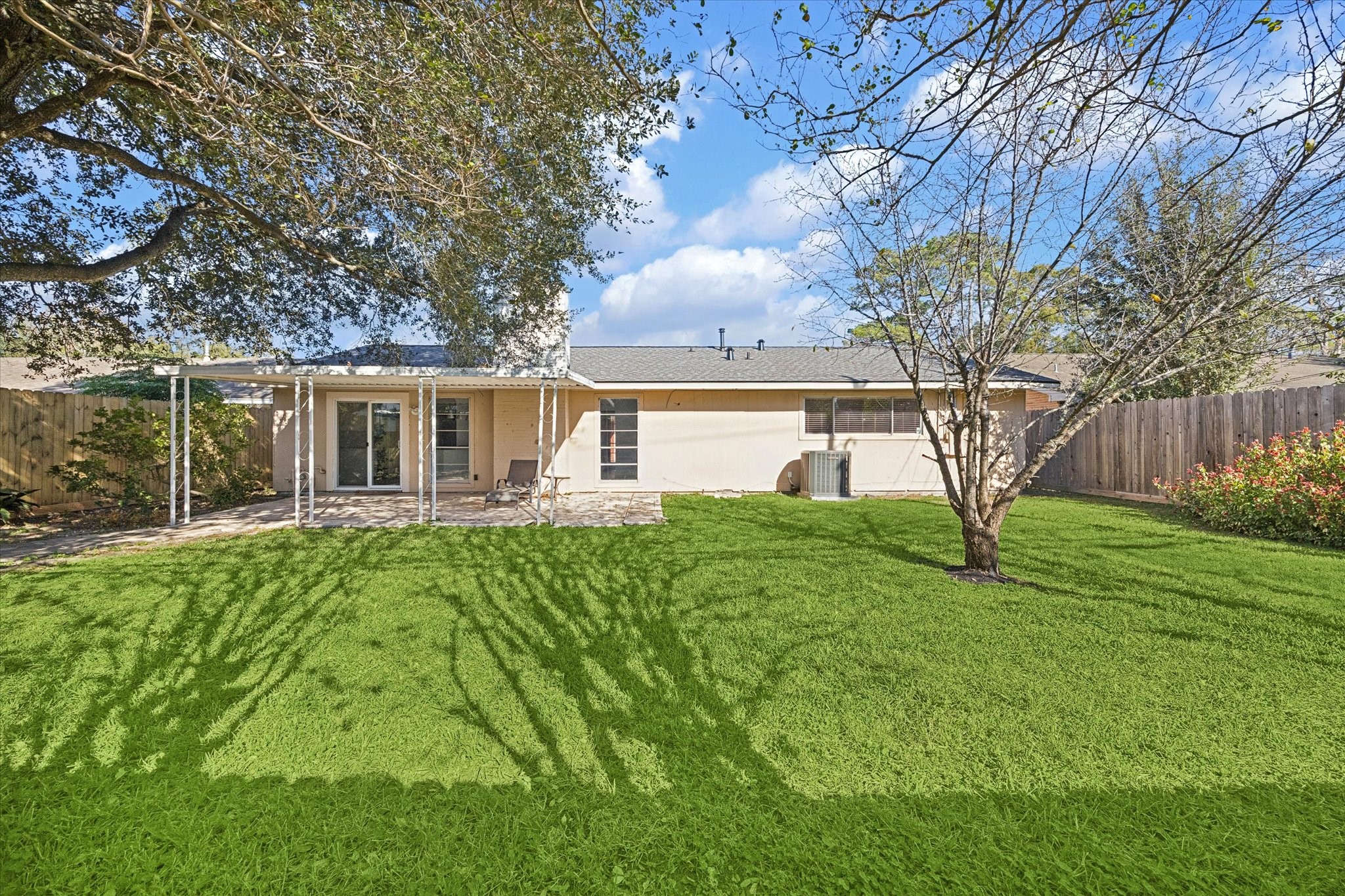 9407 Meadowbriar Lane Houston, TX 77063 - Photo 31 of 31 a view of house with a yard