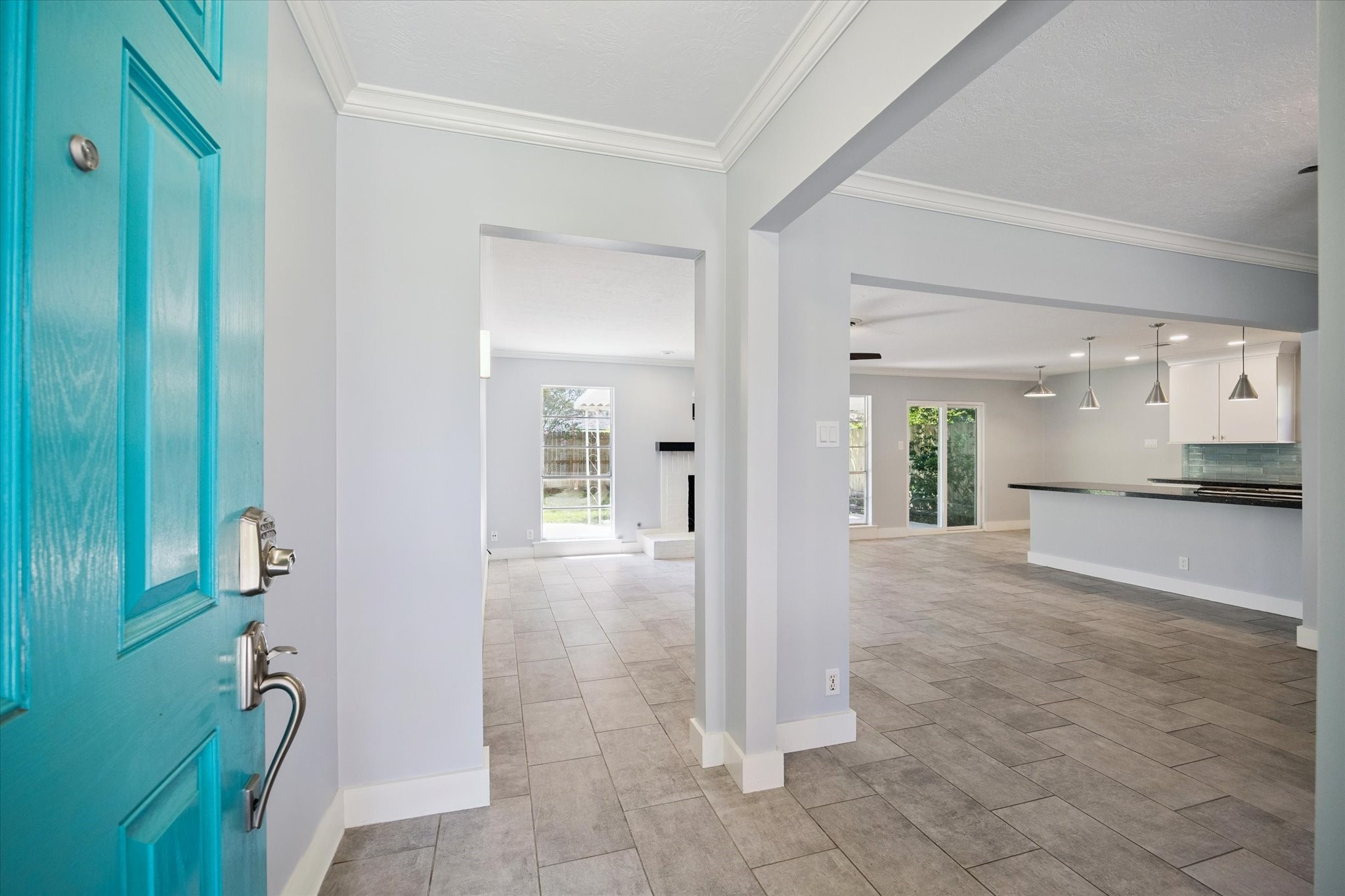 9407 Meadowbriar Lane Houston, TX 77063 - Photo 10 of 31 a view of a hallway with bathroom and mirror