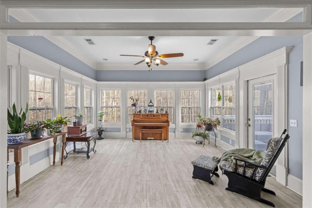8399 East Carroll Road Whitesburg, GA 30185 - Photo 11 of 52 a living room with furniture and wooden floor