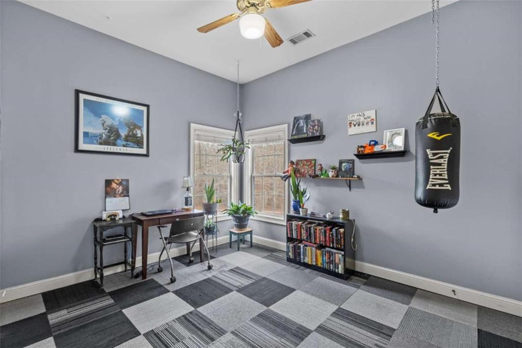 8399 East Carroll Road Whitesburg, GA 30185 - Photo 20 of 52 a work room with furniture and musical instruments