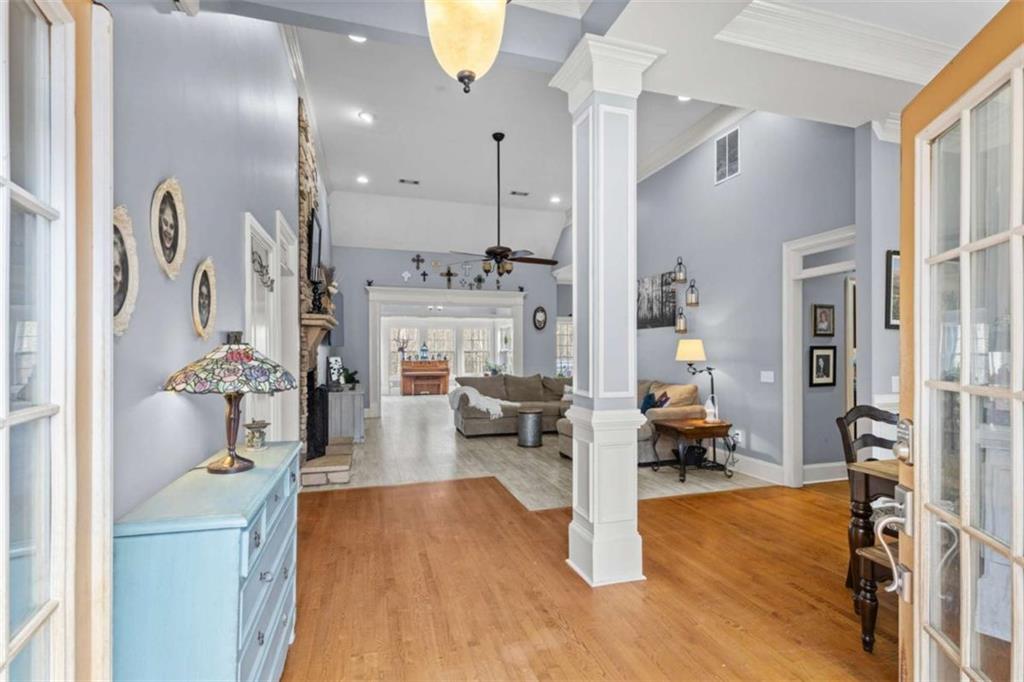 8399 East Carroll Road Whitesburg, GA 30185 - Photo 4 of 52 a living room with furniture and a wooden floor