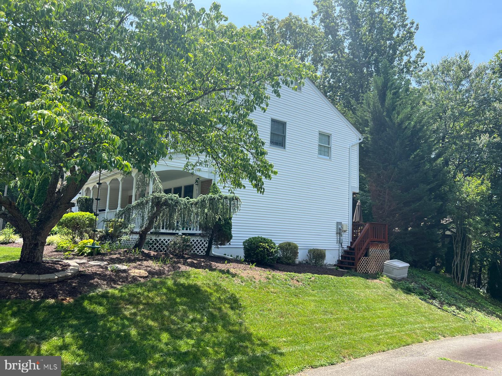 9201 Beachway Lane Springfield, VA 22153 - Photo 12 of 12 Charming home nestled in lush greenery.