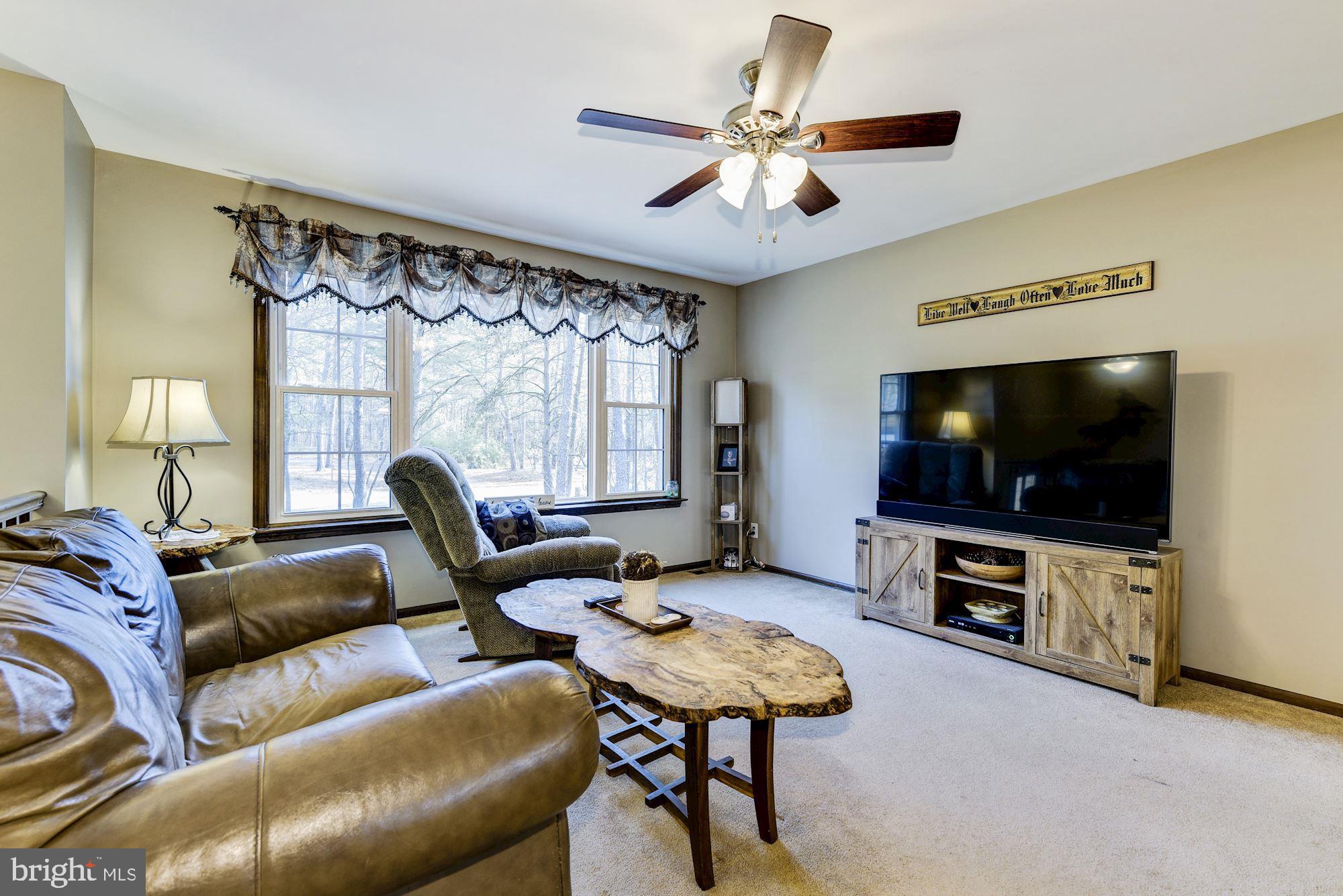 5 Spring Drive Tabernacle, NJ 08088 - Photo 3 of 29 a living room with furniture and a flat screen tv