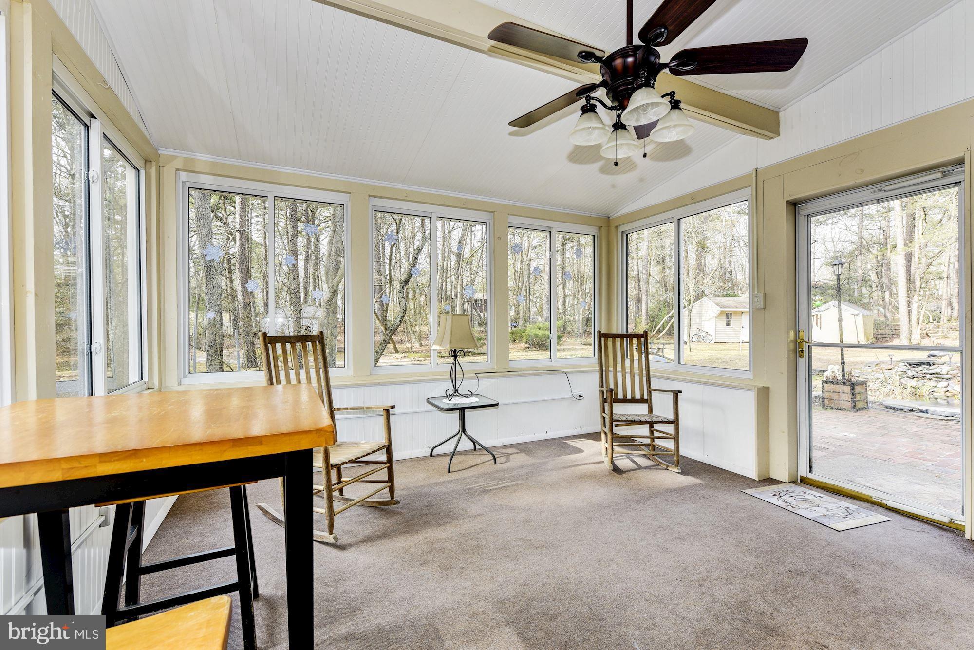5 Spring Drive Tabernacle, NJ 08088 - Photo 21 of 29 a view of a livingroom with furniture and a window