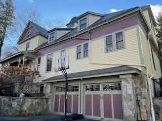 a front view of a house with a porch