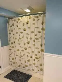 a swimming pool with outdoor seating and yard