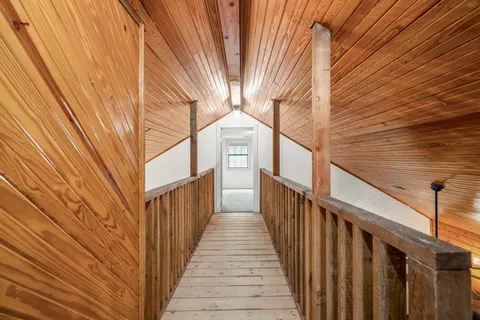 a view of a house with wooden stairs