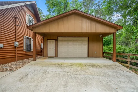 a front view of a house with a garage
