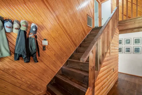 a view of entryway with wooden floor
