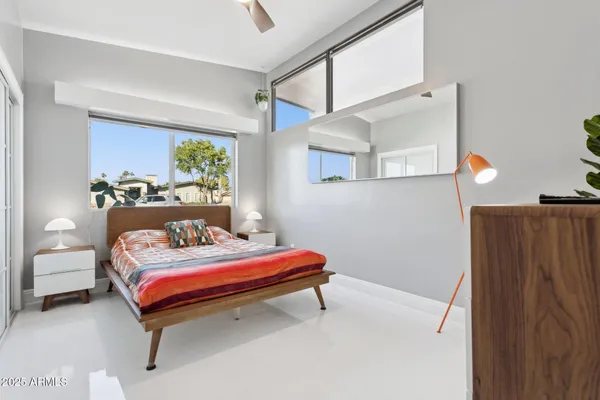 a bathroom with a tub and shower