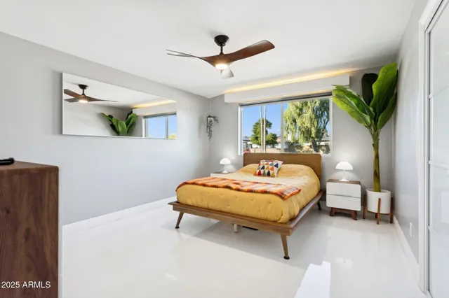 a bathroom with a sink a mirror and vanity