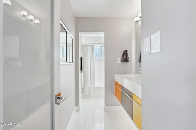 a view of an empty room with a balcony