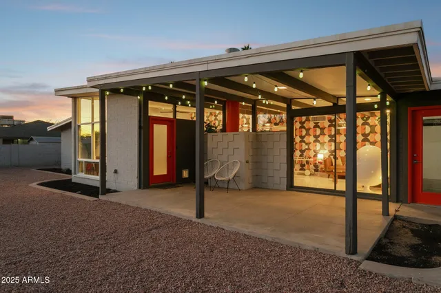 front view of a house with a basket ball court