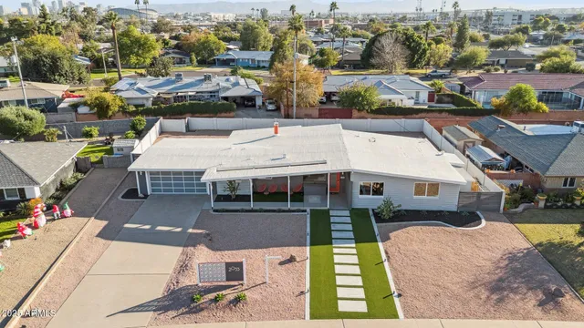 a view of an chairs in wooden floor