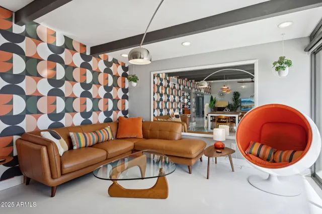 a view of a room with wooden floor and windows