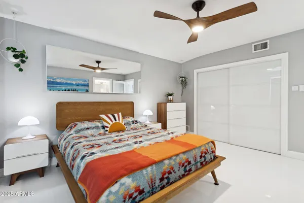 a view of a lake with houses in the back